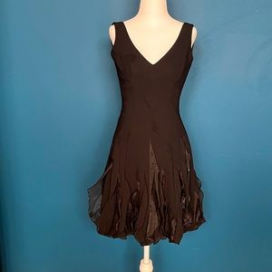 White House Black Market Black Cocktail dress with ruffled skirt. Size 00